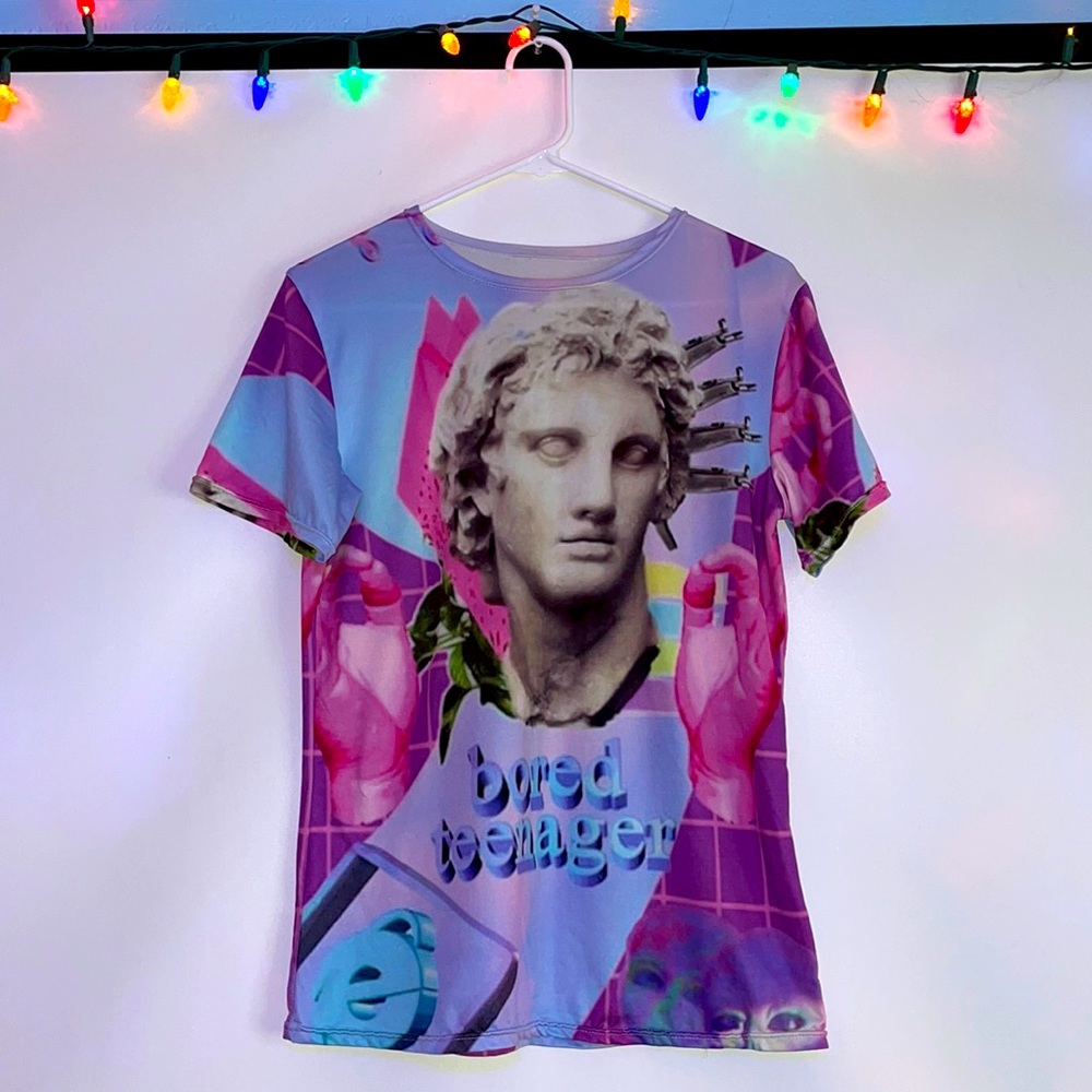 Unbranded “bored teenager” light T-shirt.